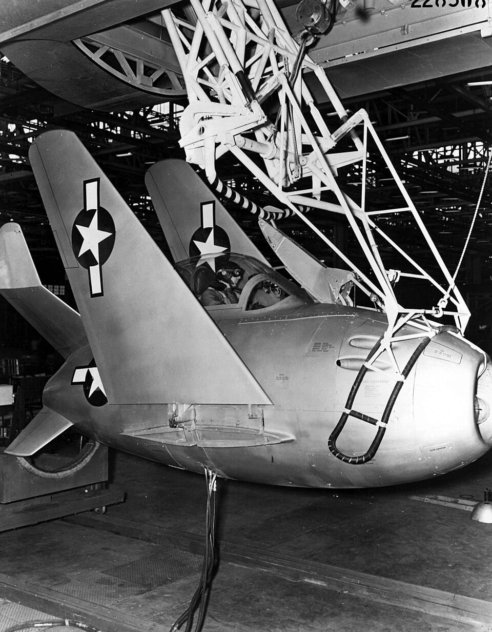 XF-85 Goblin on the trapeze hook beneath the EB-29 mothership