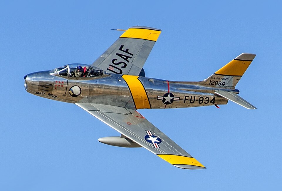 North American F-86 Sabres — the most advanced US fighter in Korea, yet vulnerable on the ground to biplane attacks