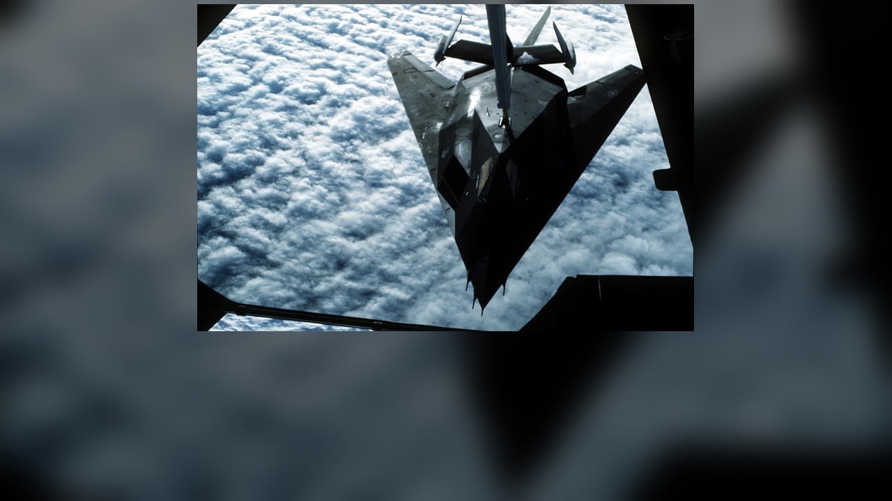 A 37th Tactical Fighter Wing F-117A Nighthawk refuels from a KC-10 in flight - the unit and aircraft type that struck Panama in 1989