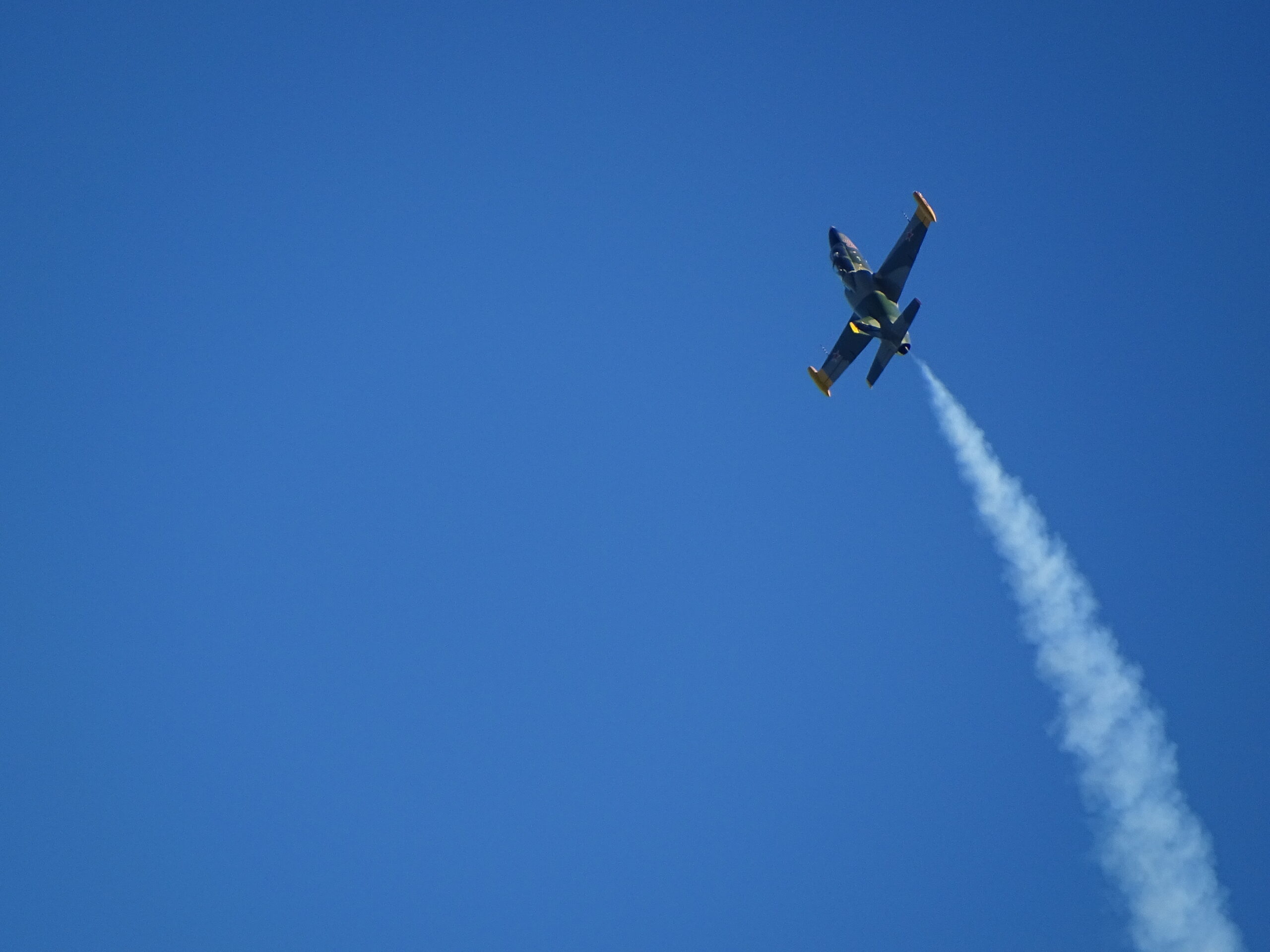 An Aero L-39 Albatros trailing smoke during an airshow display