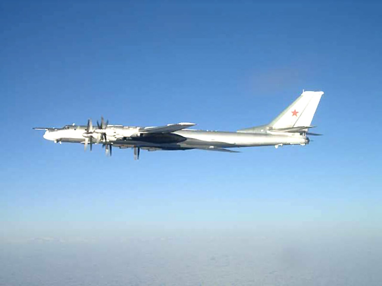 Russian Tu-95 Bear bomber in flight south of Japan