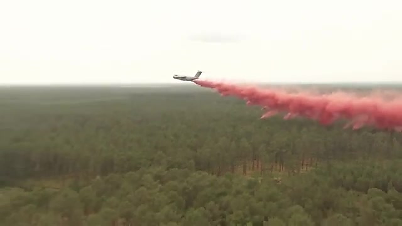 French Air and Space Force A400M dropping fire retardant