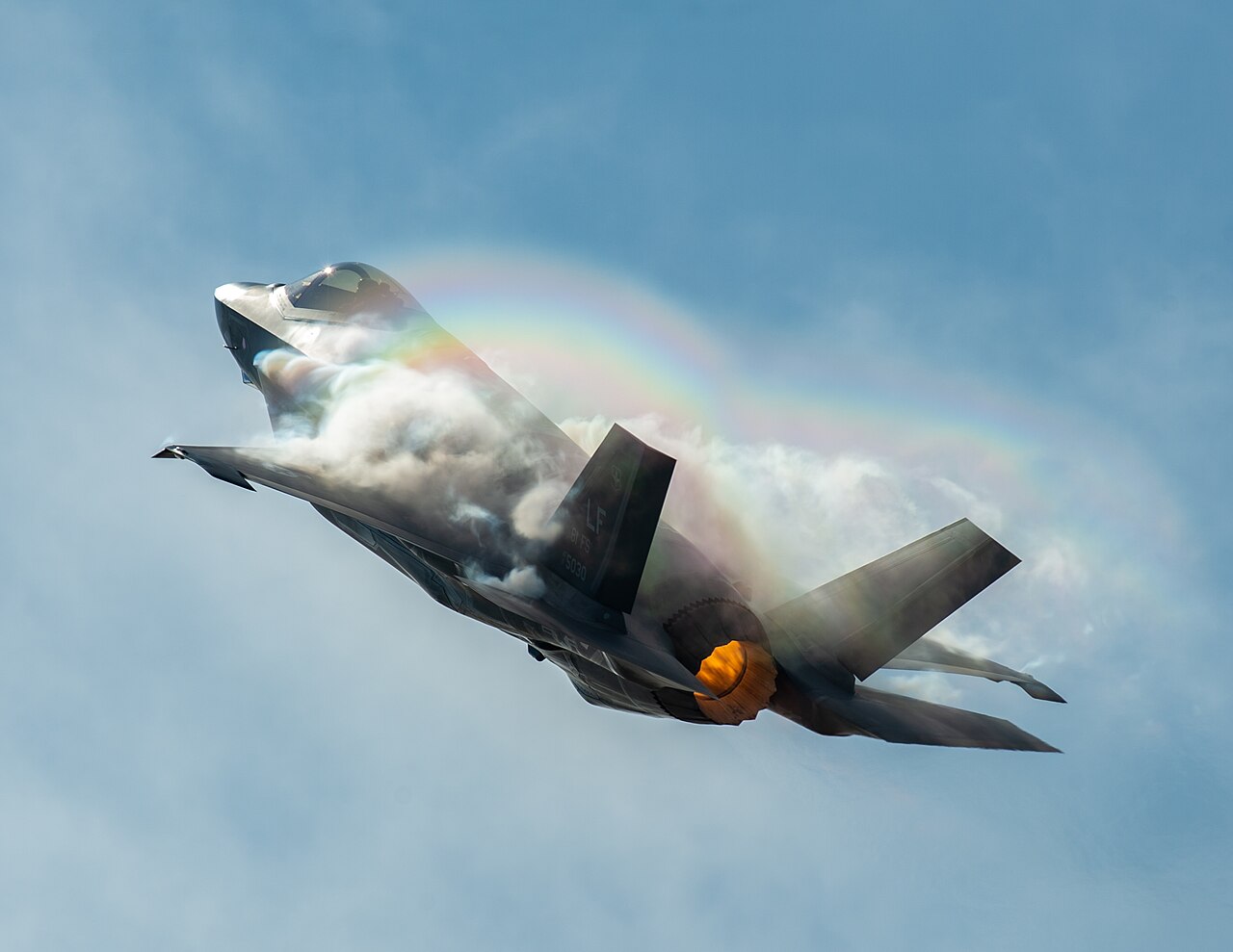 F-35A Lightning II in a high-alpha pass with vapor