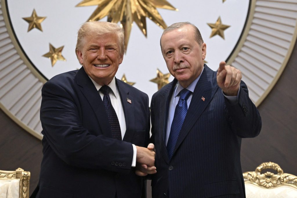 Trump and Erdogan shake hands in Ankara