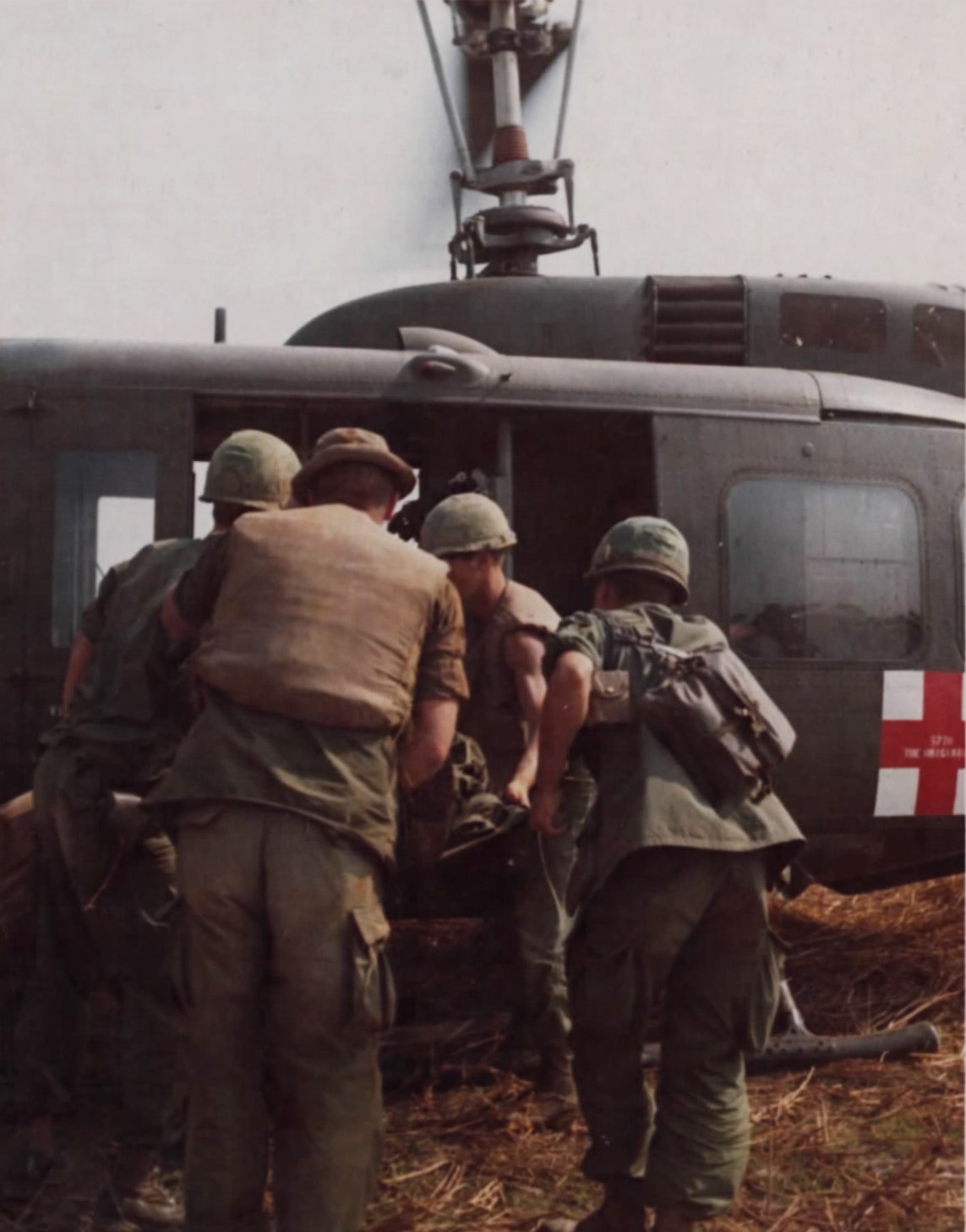 Wounded soldier loaded aboard a Dustoff UH-1D
