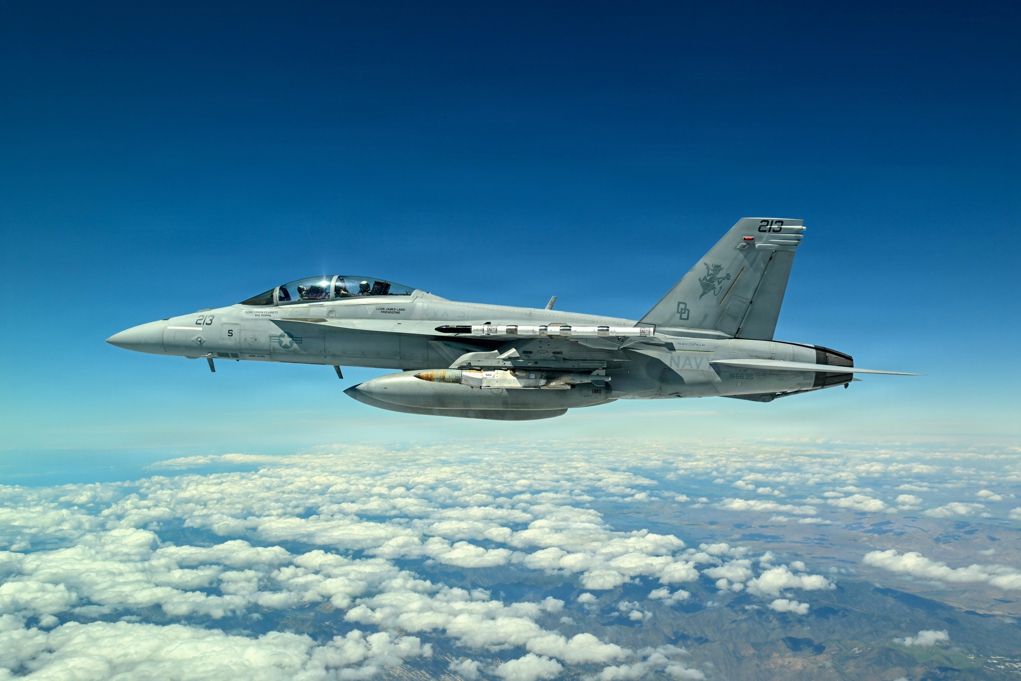 A U.S. Navy F/A-18 carries the new JDAM Long Range variant during an April 2026 test off California