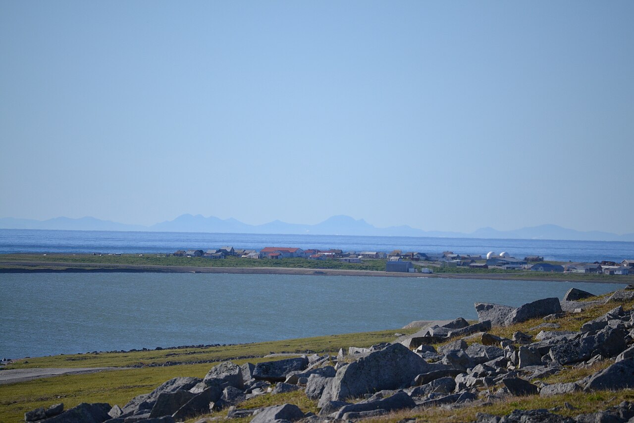 Gambell, Alaska, with the mountains of Chukotka visible across the Bering Sea