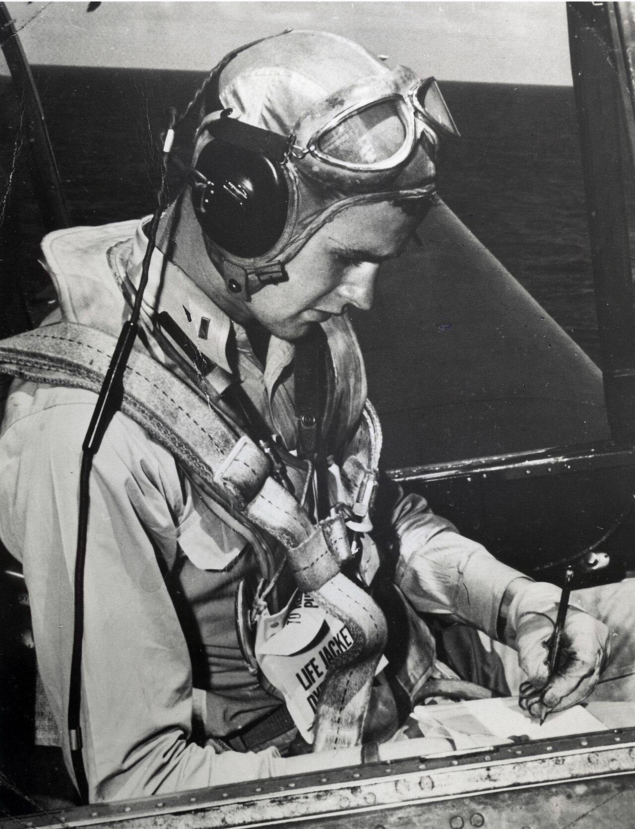 George H. W. Bush seated in the cockpit of a Grumman TBM Avenger, circa 1944