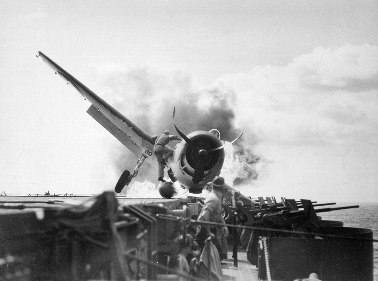 Burning Grumman F6F-3 Hellcat of VF-2 aboard USS Enterprise (CV-6) on 10 November 1943 (80-G-205473).jpg