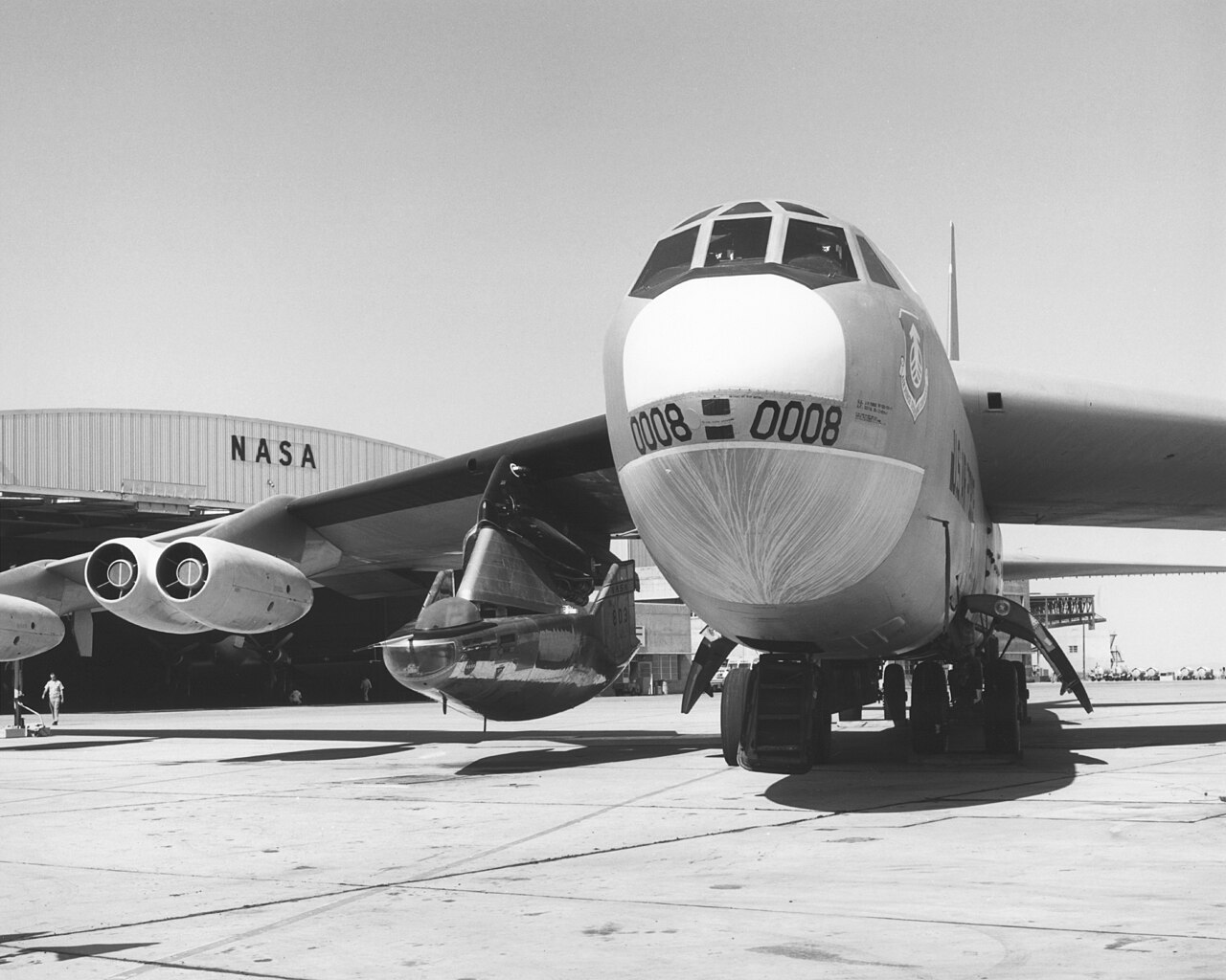 The M2-F2 mounted under the wing of its B-52 mothership