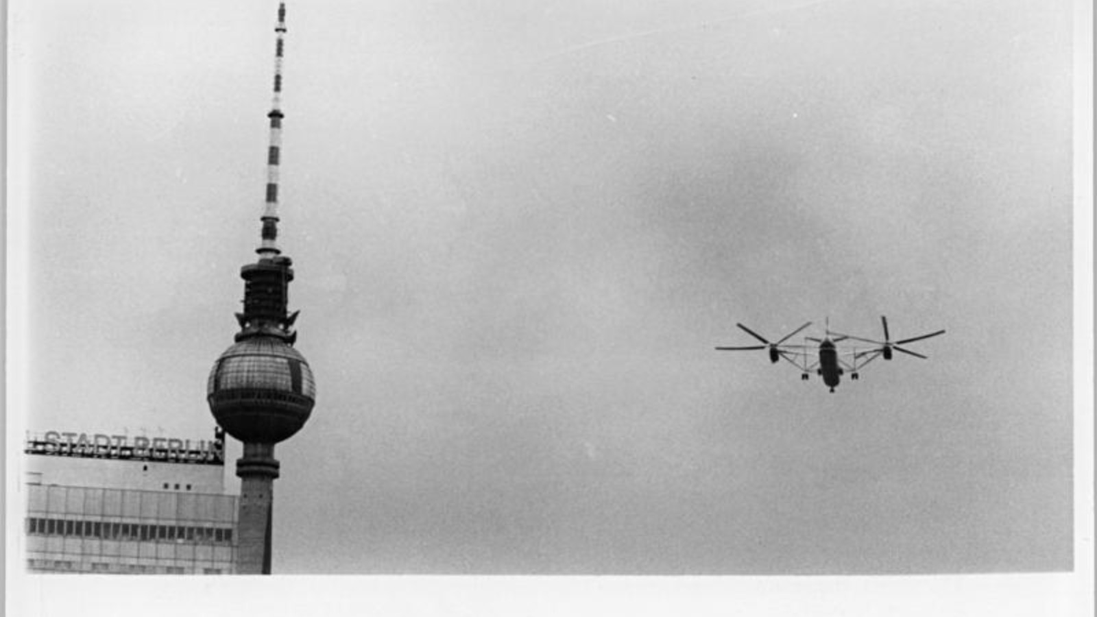 The Mil V-12 in flight over Berlin in 1971 The Mil V-12, the largest helicopter ever built, in flight past the Berlin Fernsehturm on 17 June 1971