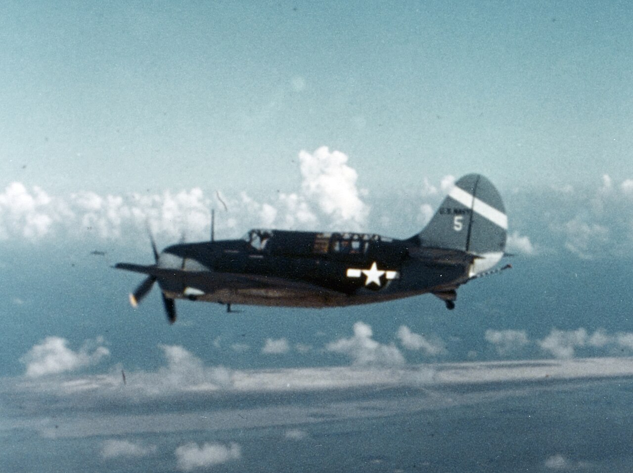 A Curtiss SB2C Helldiver dive bomber in flight