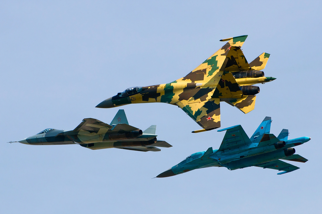 Su-35S in formation with a Su-34 and a Su-57