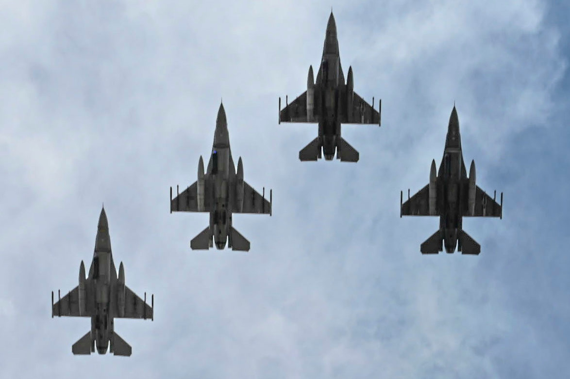 Four F-16 Fighting Falcons of the 120th Fighter Squadron, Colorado Air National Guard, in flyover formation Four F-16 Fighting Falcons of the 120th Fighter Squadron, 140th Wing, Colorado Air National Guard, flying a four-ship flyover