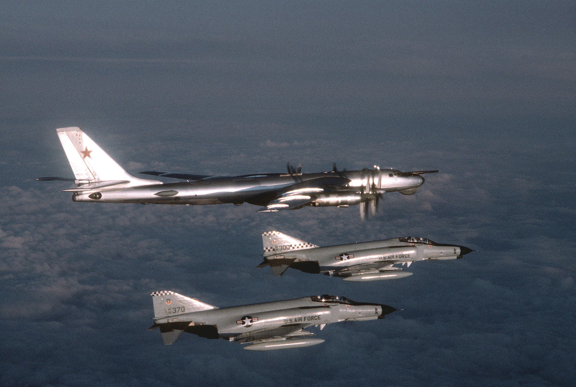 Two 57th FIS F-4E Phantoms escorting a Soviet Tu-95 Bear