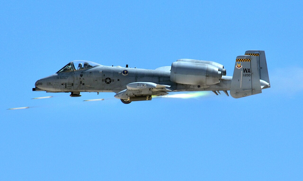 An A-10 of the 66th Weapons Squadron with WA tail code firing rockets over the Nevada Test and Training Range