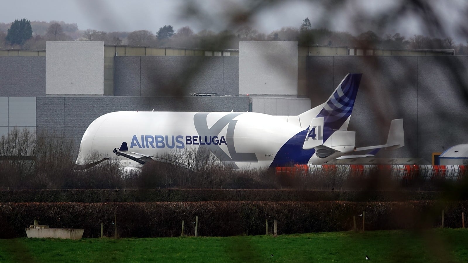 An Airbus BelugaXL parked outside the wing factory at Hawarden Airport, Broughton