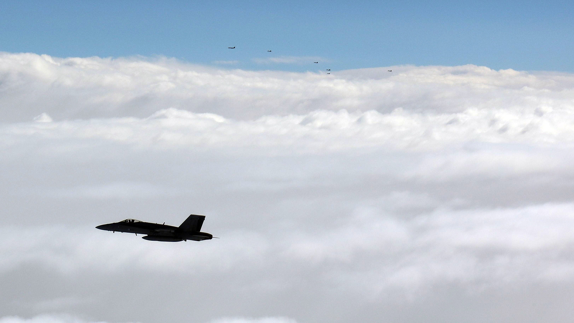 A Finnish Air Force F/A-18 Hornet shadowing a Russian formation over the Gulf of Finland on 24 September 2026