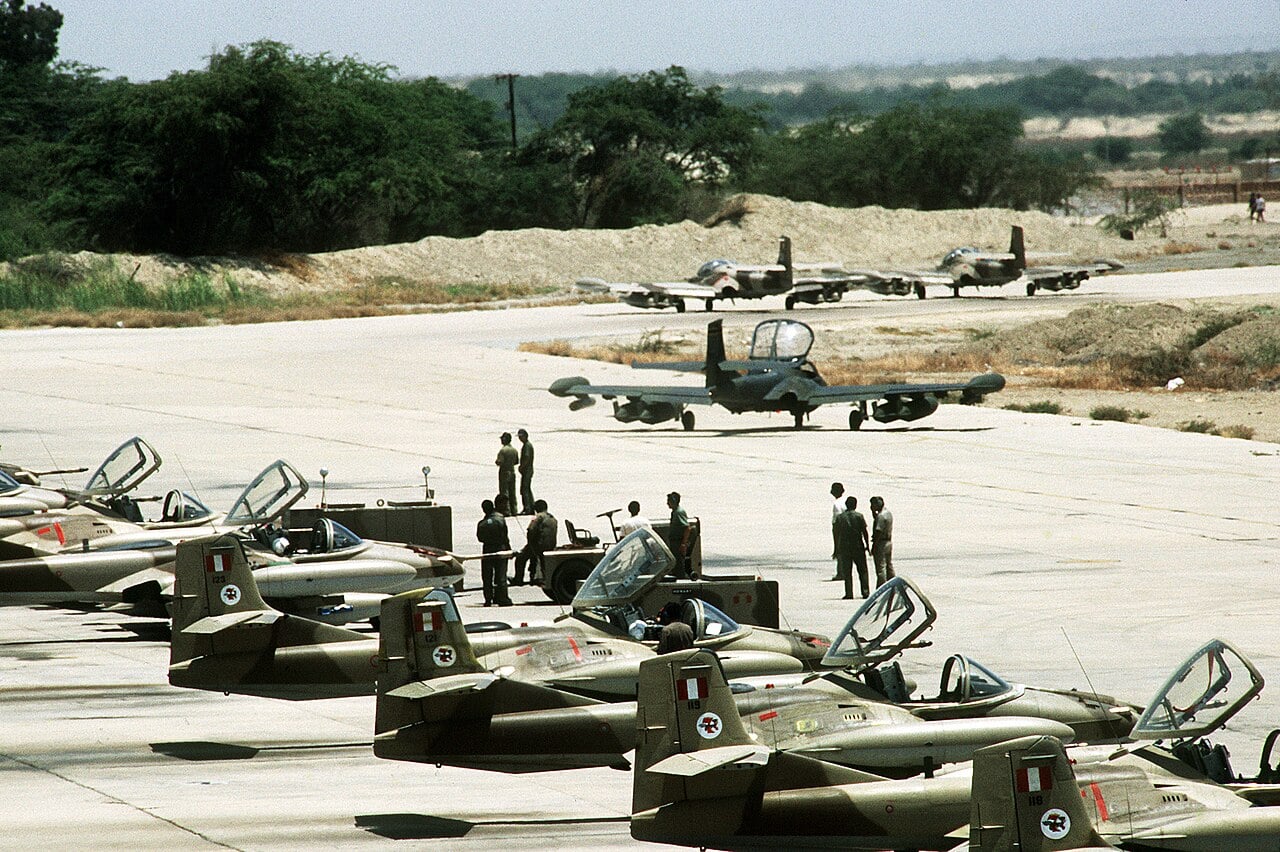 A line of Peruvian Air Force Cessna A-37B Dragonfly light attack aircraft parked on a ramp