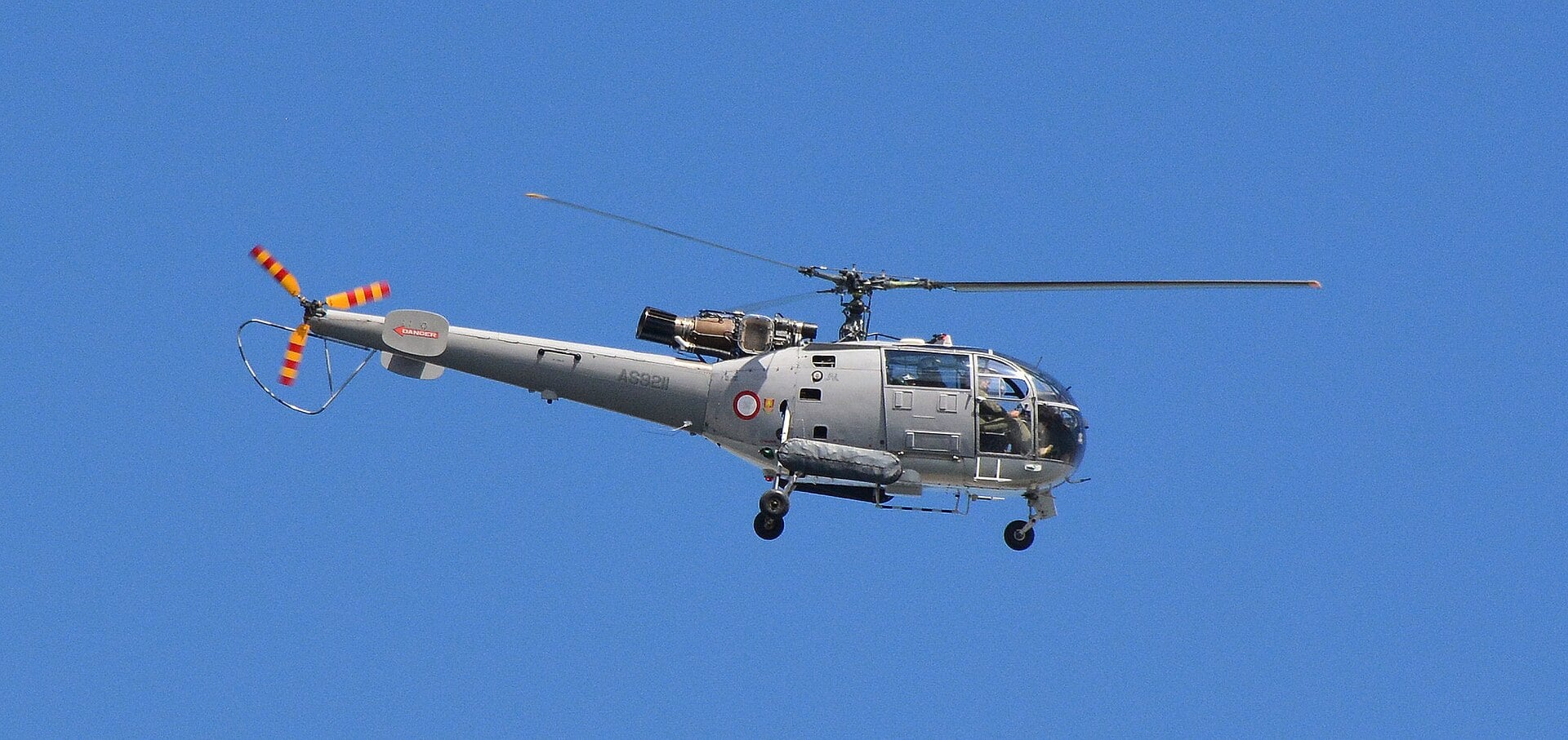 An Aerospatiale Alouette III helicopter in flight
