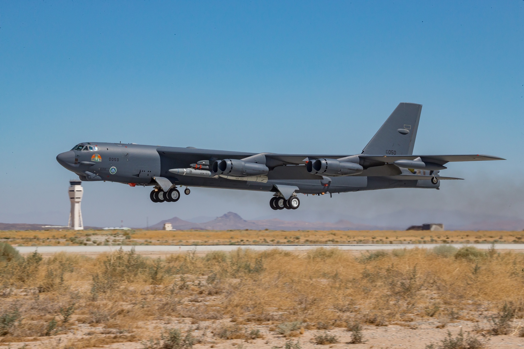 AGM-183A ARRW hypersonic prototype under the wing of a B-52H at Edwards AFB AGM-183A ARRW hypersonic prototype under the wing of a B-52H at Edwards AFB