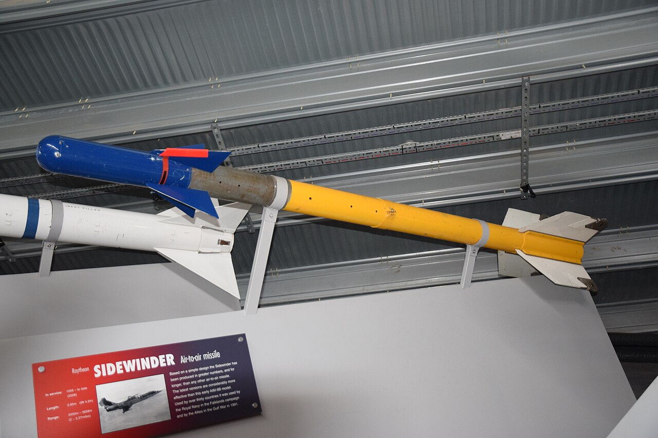 AIM-9 Sidewinder on display An AIM-9 Sidewinder air-to-air missile on museum display showing its fins and rollerons