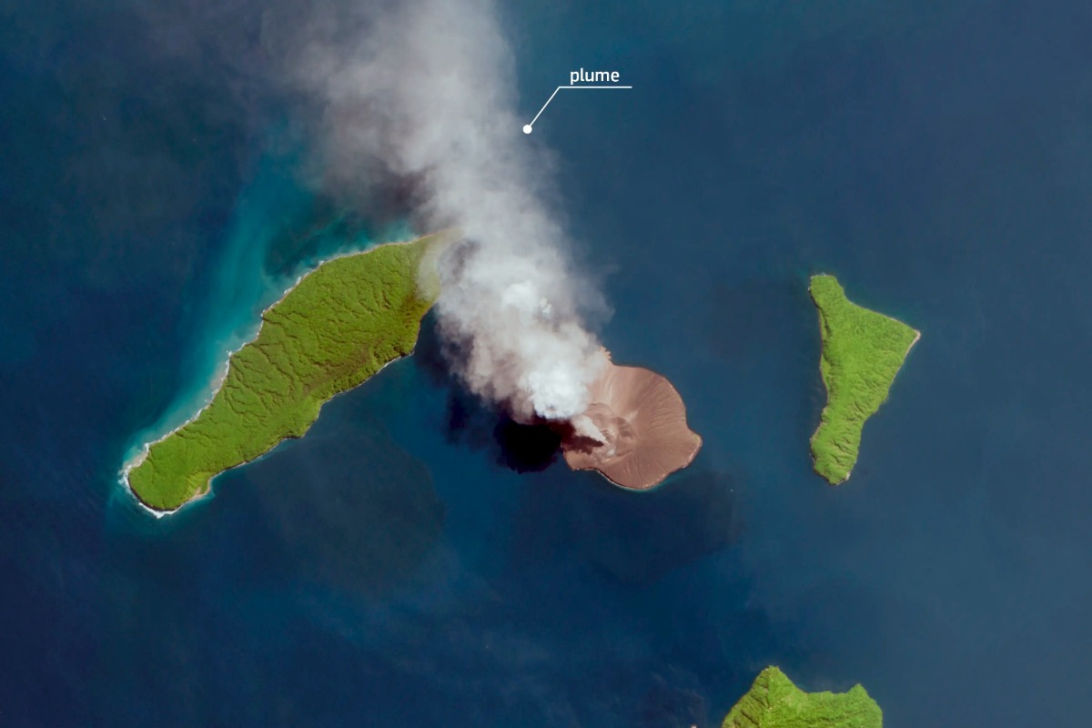 Satellite view of Anak Krakatau in the Sunda Strait with an ash plume drifting north