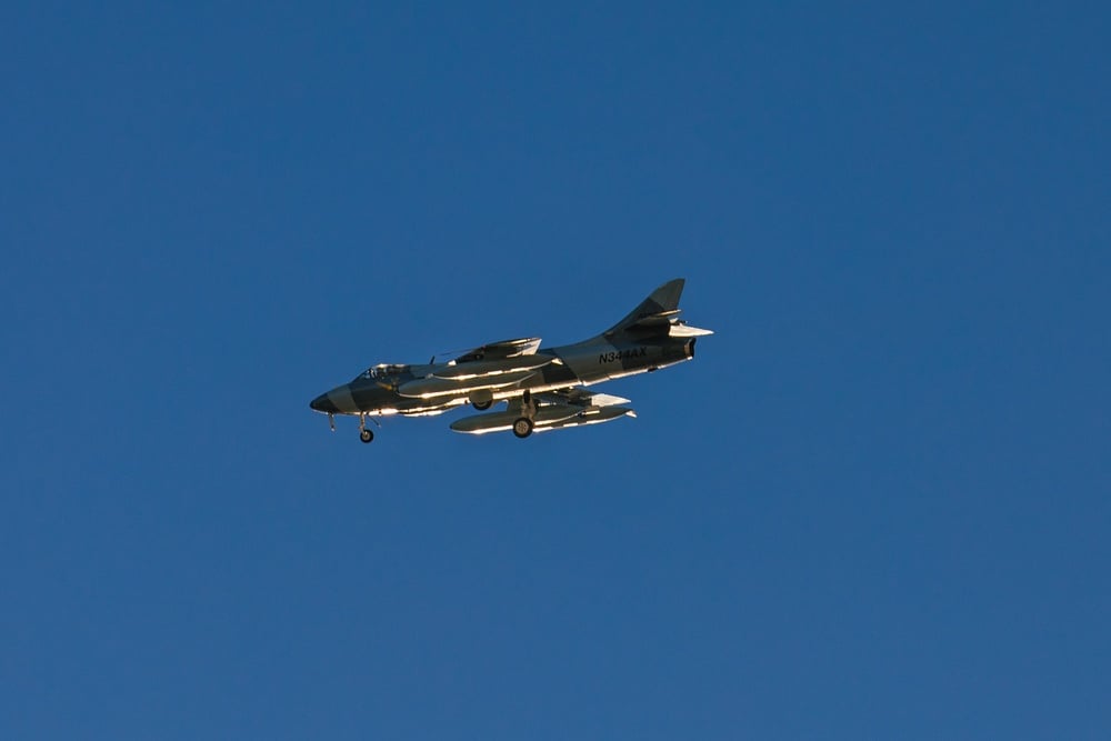ATAC MK-58 Hawker Hunter in grey camouflage over Naval Air Station Point Mugu