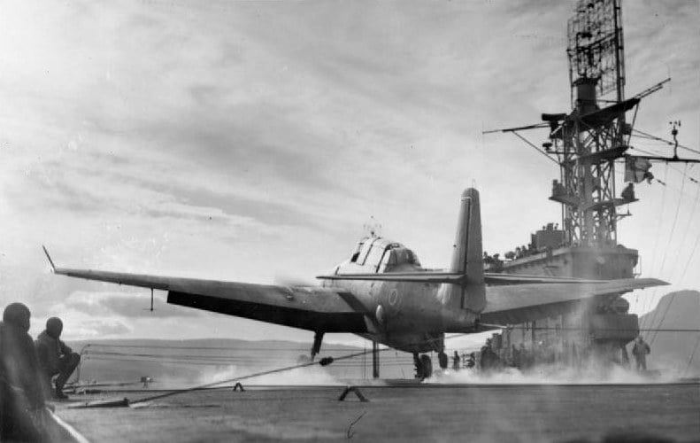 A Fleet Air Arm Grumman Avenger Mk I of 846 Naval Air Squadron lands aboard the escort carrier HMS Trumpeter