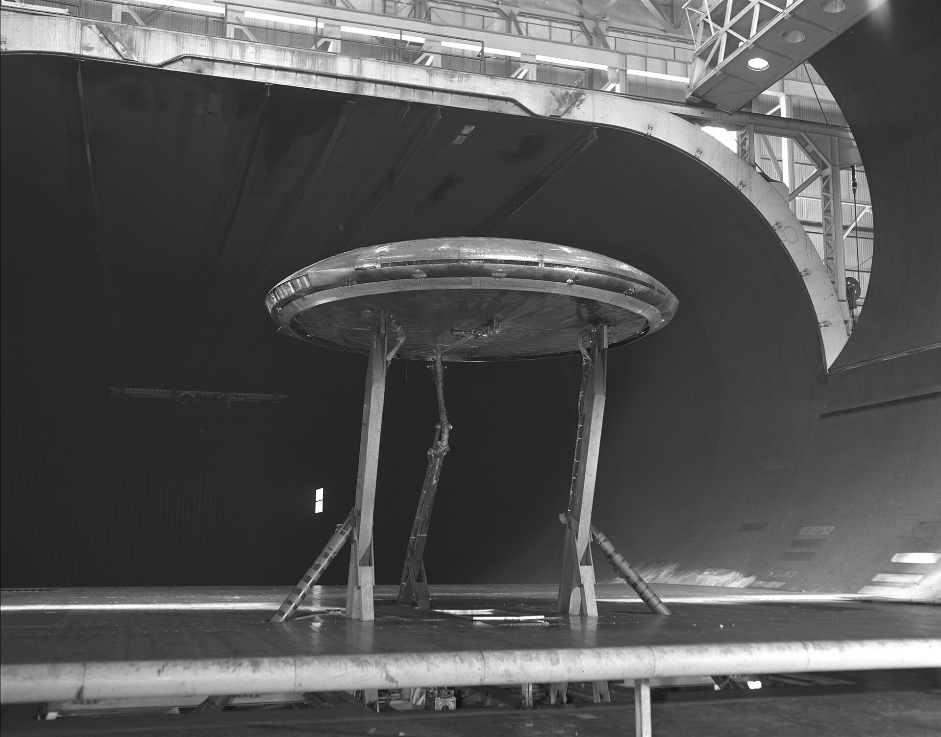 The disc-shaped Avro Canada VZ-9 Avrocar on struts inside the Ames 40- by 80-foot wind tunnel