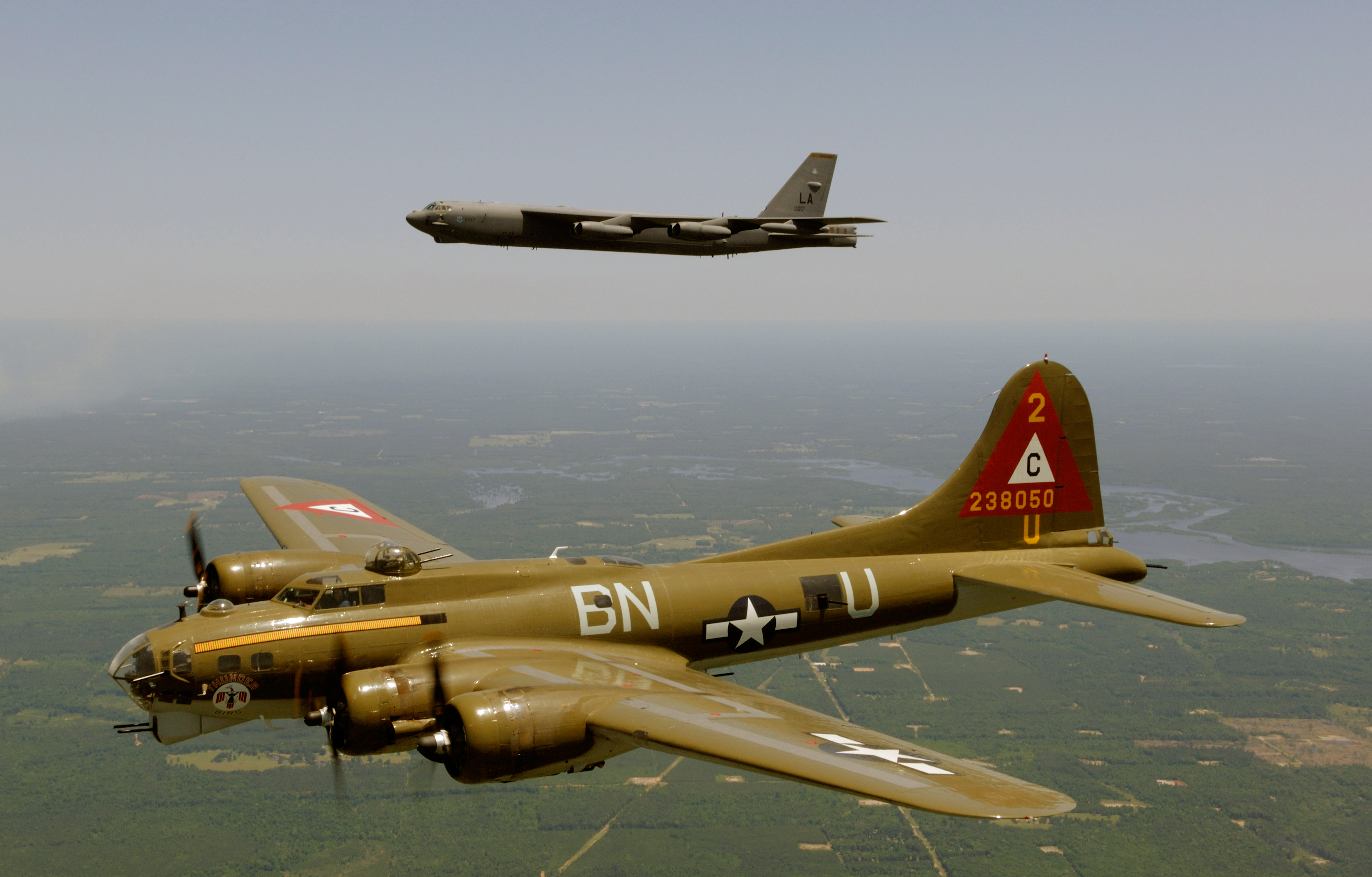 A B-17 and a B-52 in flight