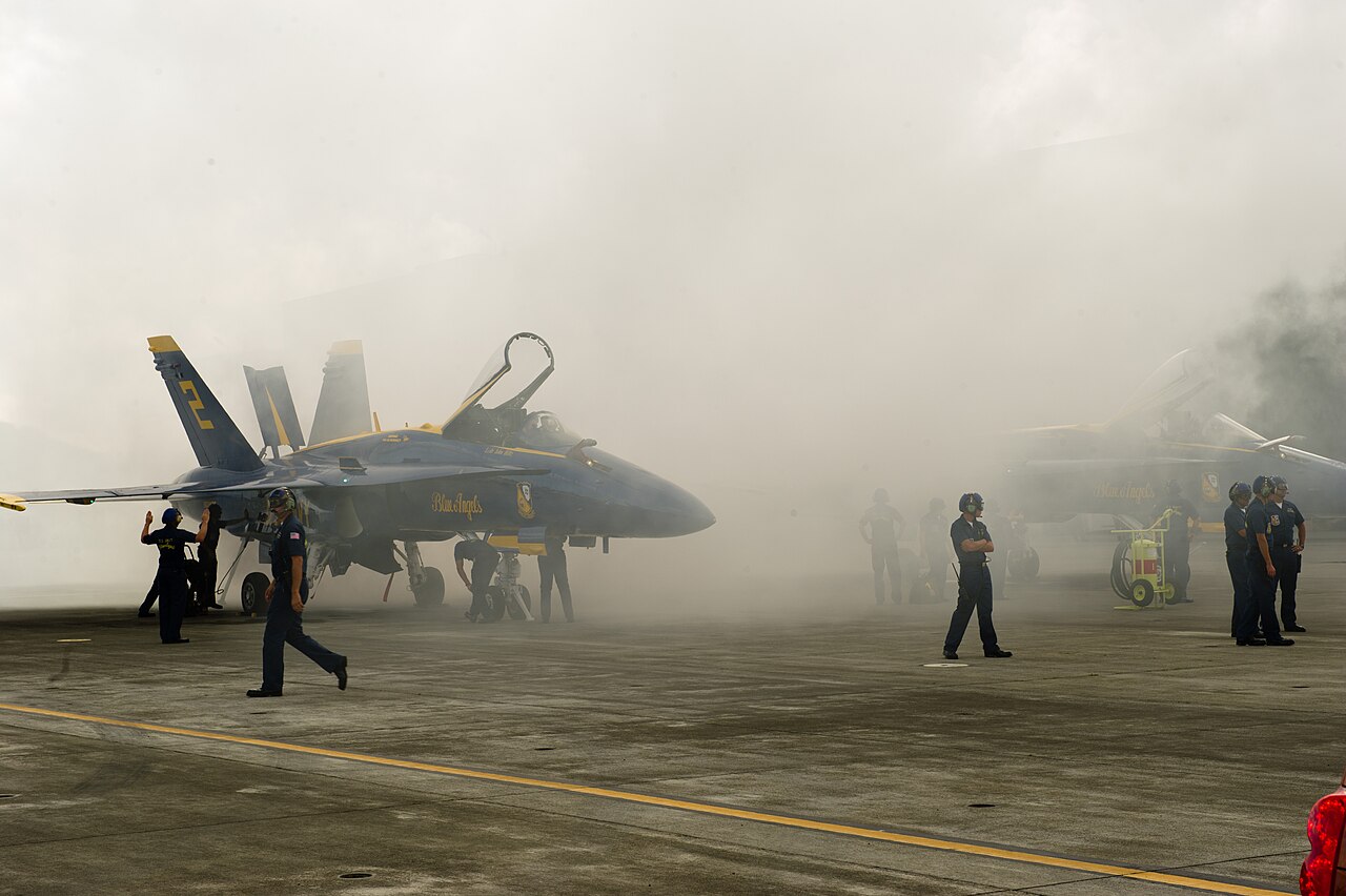 Blue Angels F/A-18 Hornets testing their smoke systems on the ground