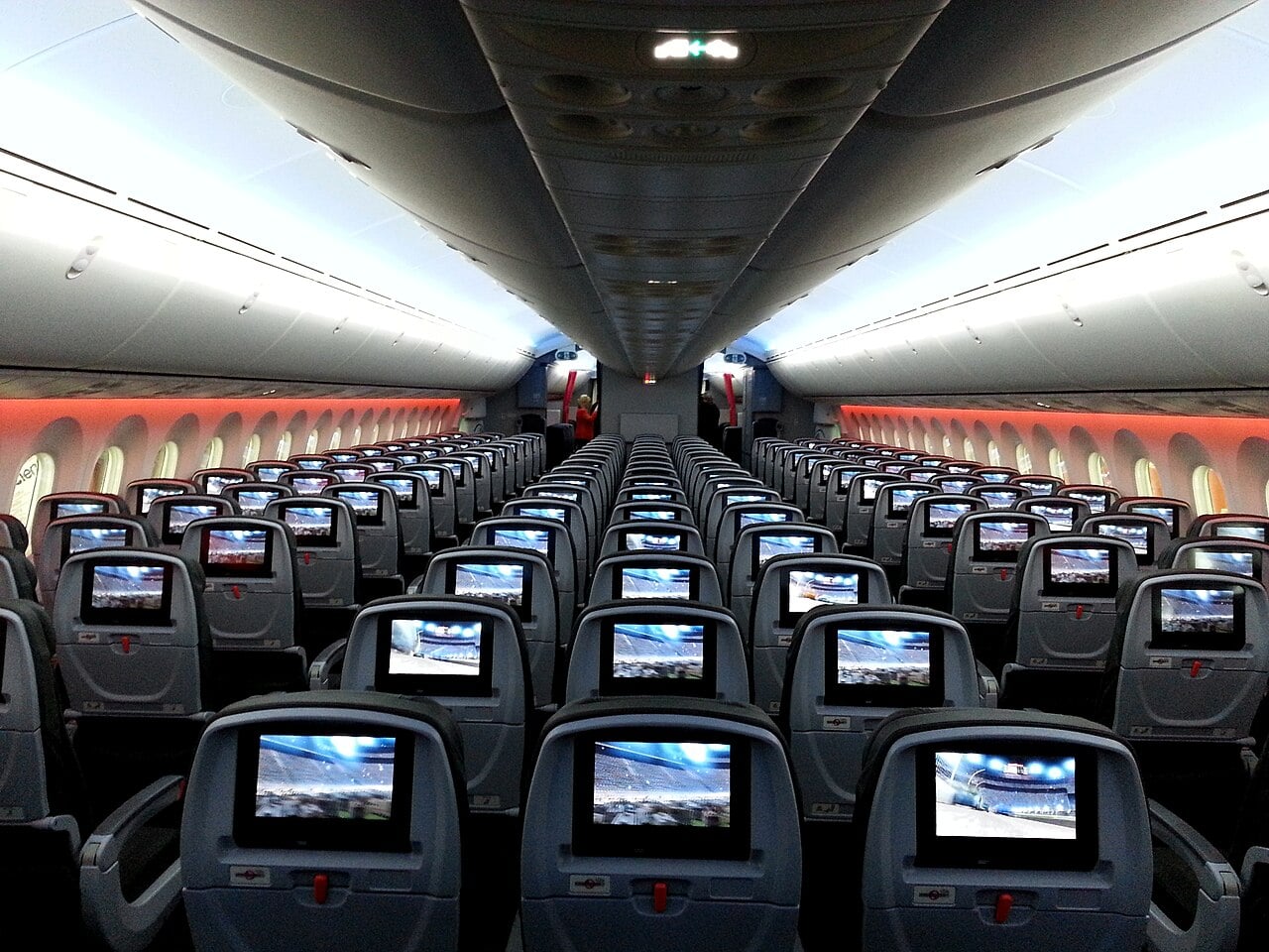The passenger cabin of a Jetstar Boeing 787 seen from the front