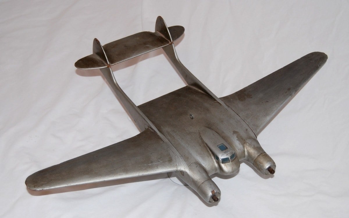 Wooden wind tunnel model of the Burnelli CBY-3 showing the airfoil fuselage and twin booms