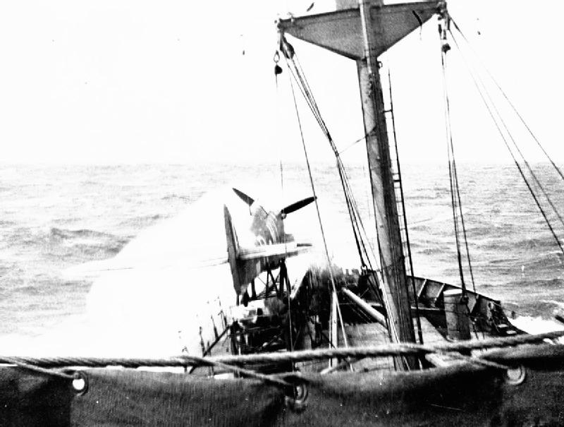 Heavy seas breaking over a CAM ship Hurricane