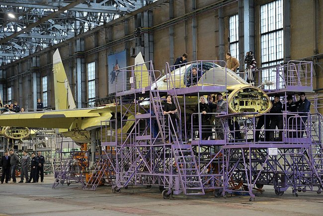 Su-34 airframes under construction on scaffolding inside the assembly shop at the Chkalov Novosibirsk Aviation Plant