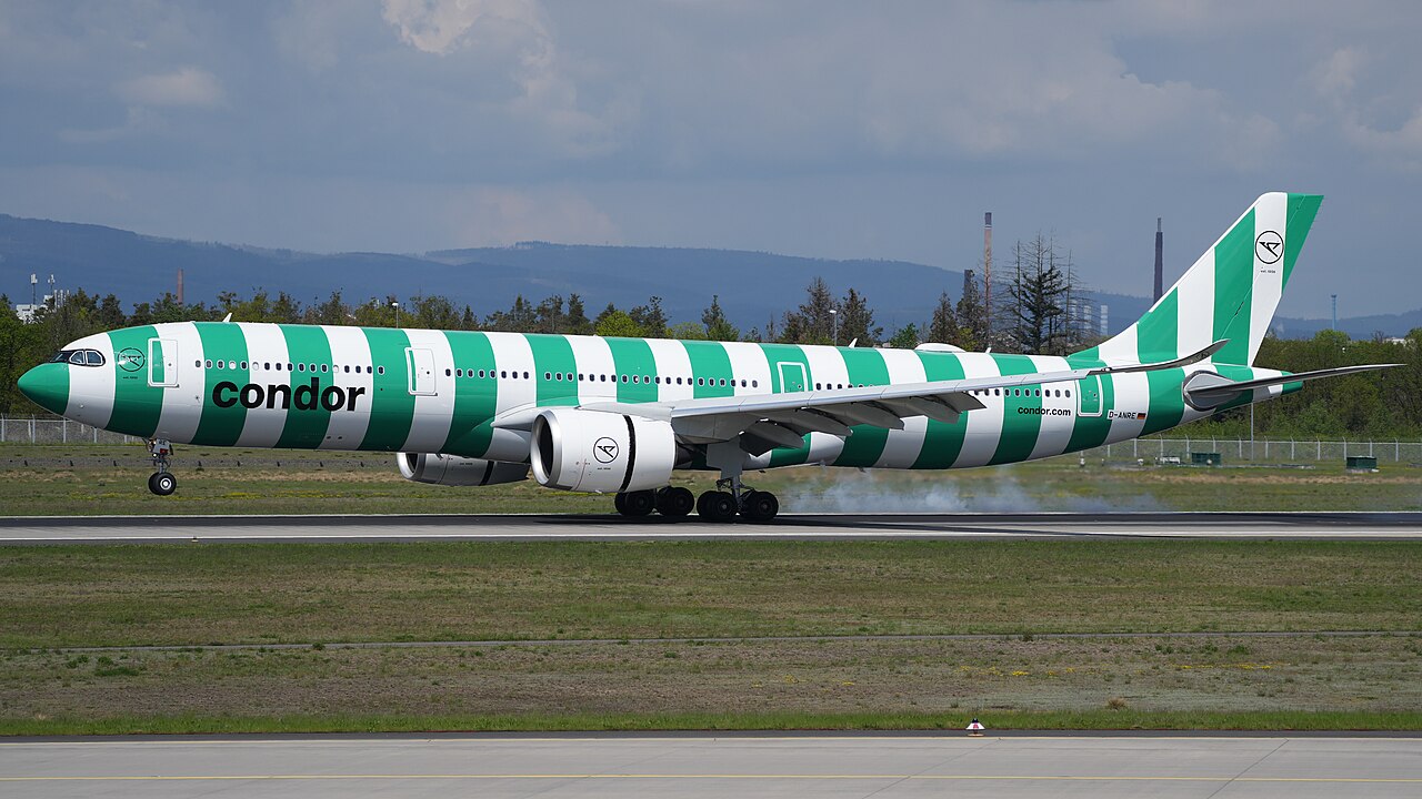 A Condor Airbus A330-900neo in the green striped livery touching down at Frankfurt