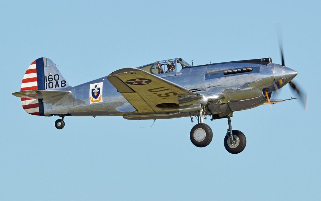 Rare P-40C Warhawk Belly-Lands in a Field Near Royston