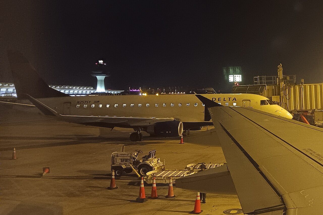 A Delta Connection Embraer E175 regional jet on the ground