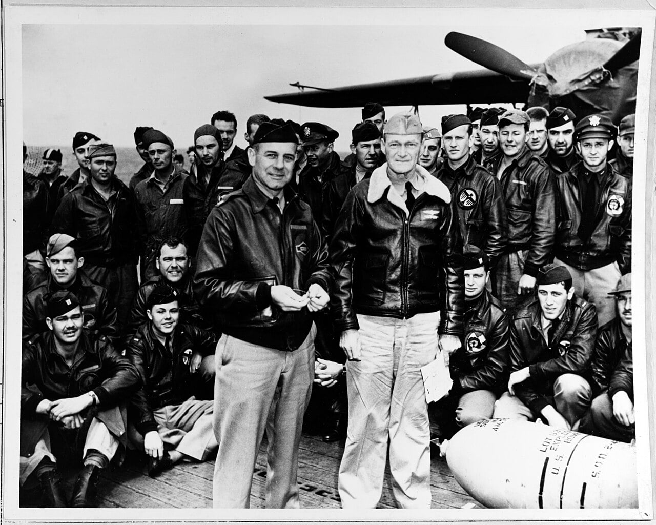 Lieutenant Colonel James Doolittle and Captain Marc Mitscher with aircrews aboard USS Hornet, April 1942