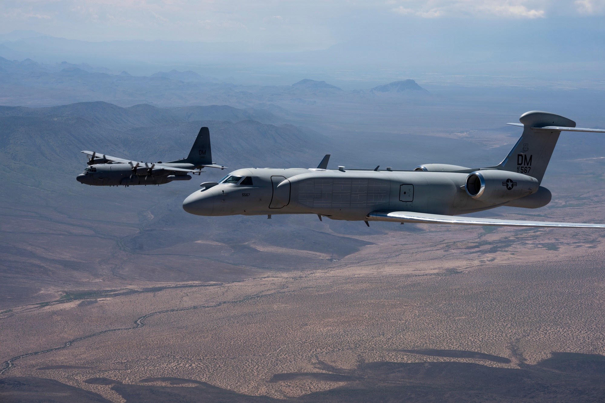 EA-37B and EC-130H Compass Call in formation over southern Arizona EA-37B and EC-130H Compass Call in formation over southern Arizona