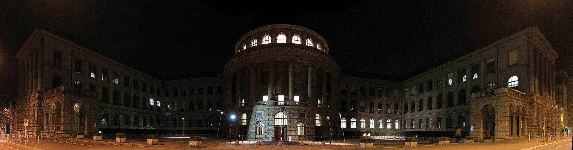 The main building of ETH Zurich at night, home of the Center for Security Studies
