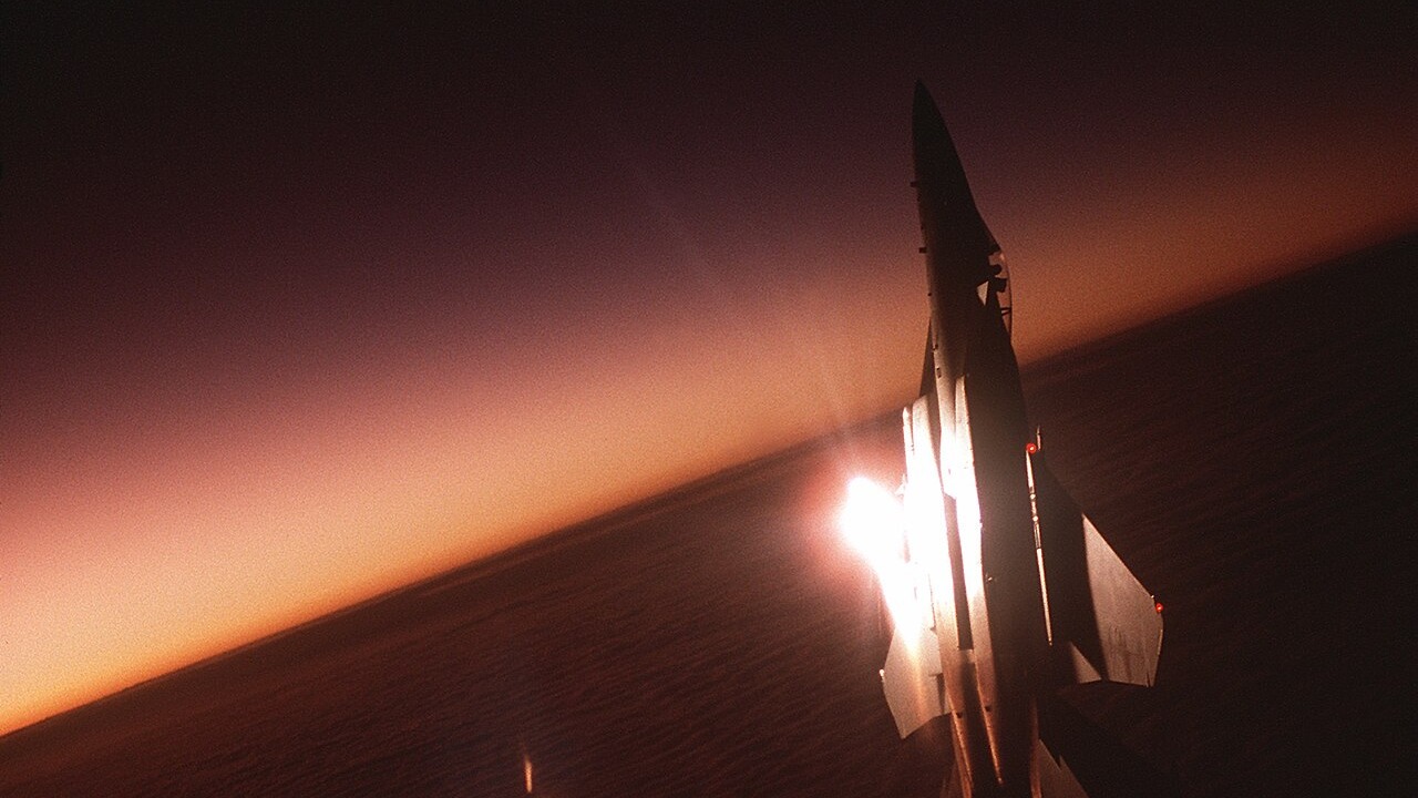 f-15-eagle-vertical-climb-above-clouds-sunset