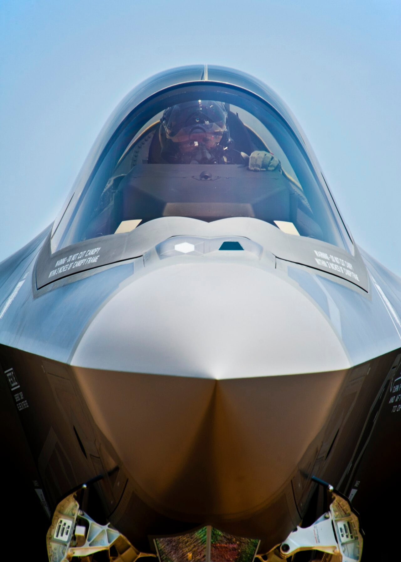 Close-up of an F-35 Lightning II canopy showing the transparent coating and the canopy frame