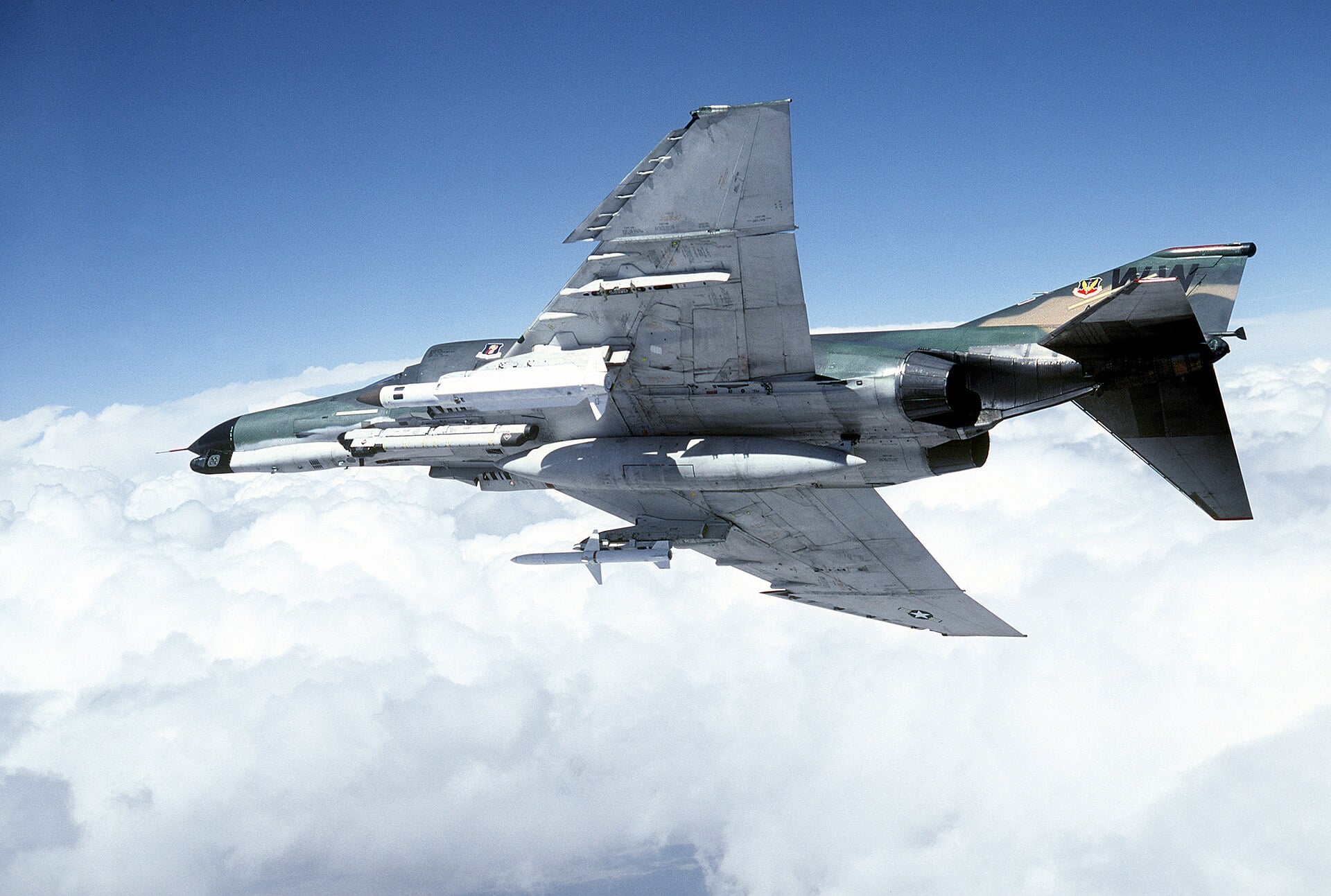 F-4G Phantom II Advanced Wild Weasel with AGM-78 and AGM-45 anti-radiation missiles An F-4G Phantom II Advanced Wild Weasel banking over a range carrying an AGM-78 Standard ARM and an AGM-45 Shrike