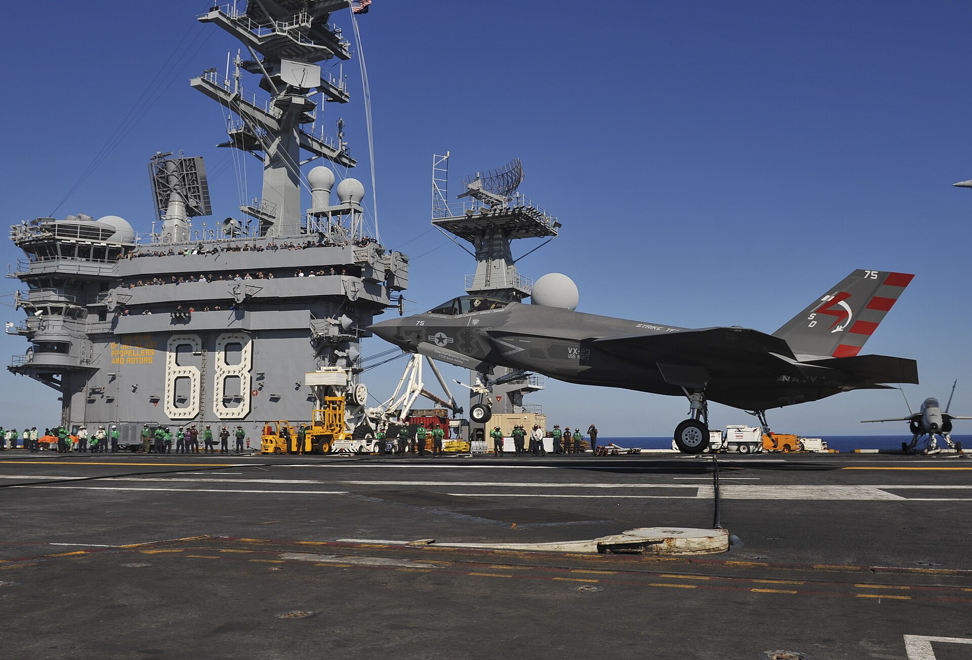 An F-35C Lightning II catches an arresting wire aboard USS Nimitz