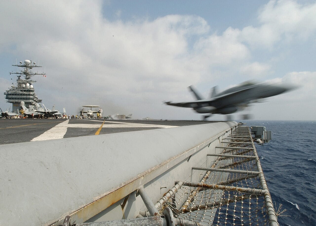 F/A-18 Hornet leaving the bow catapult of a US Navy aircraft carrier