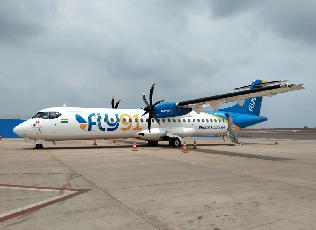 A FLY91 ATR 72-600 turboprop on the ramp in the Goa-based airline livery