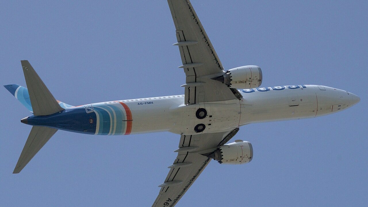 flydubai Boeing 737 MAX 8 A6-FMN flydubai Boeing 737 MAX 8 A6-FMN seen from below just after take-off