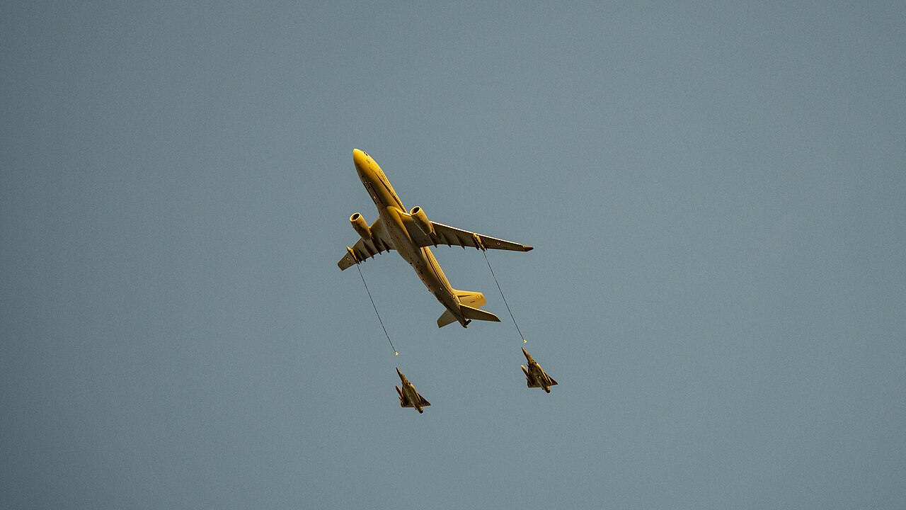 A French Air and Space Force Airbus A330 MRTT Phenix trailing its refuelling hoses